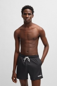 Fully lined swim shorts with contrast logo