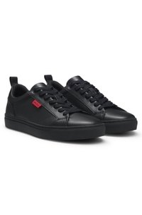 Faux-leather trainers with red logo flag