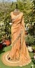 Peach golden tissue saree