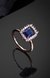 Estele Rosegold Plated CZ Square Designer Finger Ring With Blue Stones for Women(Adjustable)