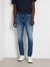 Carry Mid Solid Mid Rise Tapered Jeans
