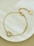 Guess Women Amami Gold Pleated Steel Bracelet