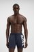 Swim shorts with vertical logo print