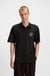 Relaxed-fit polo shirt in cotton with split logo