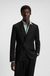 Slim-fit suit jacket with logo closure