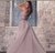 Multi off shoulder gown with overskirt