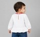 Baby Girls White Textured Waffle Top with Contrast Bow Accent and Peplum Hem